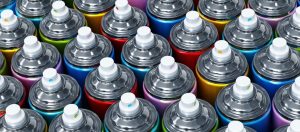 Multi colored spray paints background.